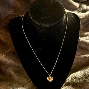 NF stamped silver toned necklace with heart pendant